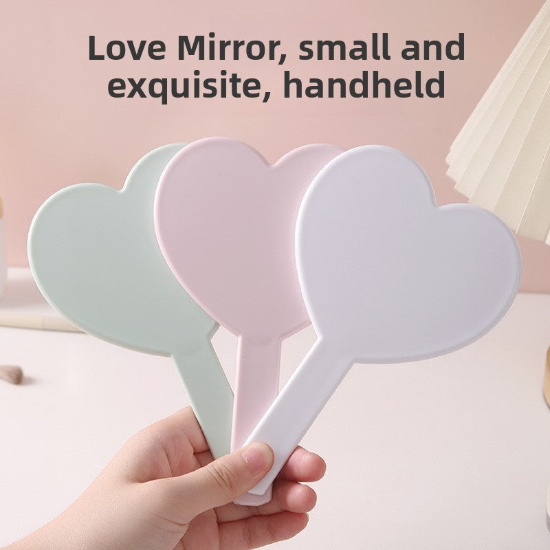Heart shaped portable makeup mirror with handle